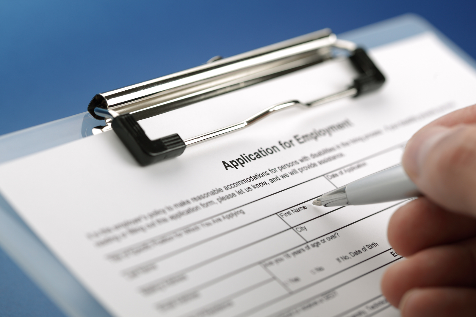 Completing an employment application form Infinity Staffing Services